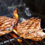 Steaks on barbecue