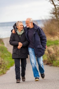 happy mature couple relaxing baltic sea dunes