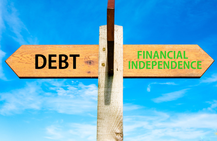 Wooden signpost with two opposite arrows over clear blue sky, Debt versus Financial Independence messages, Personal Finance conceptual image