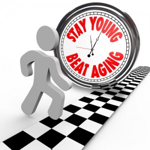 A runner in a race against time crosses the finish line before a clock with the words Stay Young Beat Aging, an attempt to maintain youth through exercise and put off the aging process