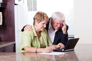 senior couple worrying about their money situation