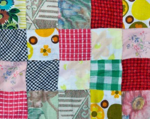 Section of a hand-stitched patchwork quilt