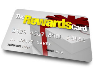 A credit card with the name The Rewards Card and a present shown on it illustrating the benefits, refunds and rebates you can earn by using a membership account