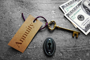 Gold key with Annuity tag, with keyhole and cash