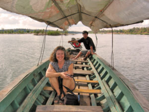 akaisha-in-a-longboat-on-the-mekong-river