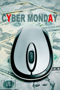 the sentence cyber monday and a computer mouse on a background full of dollar banknotes